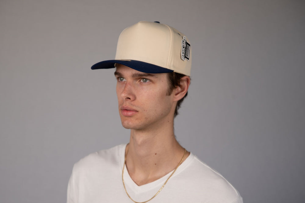 5-Panel Snapback (Curved Bill) — Natural / Navy Bill — Dozen Pack